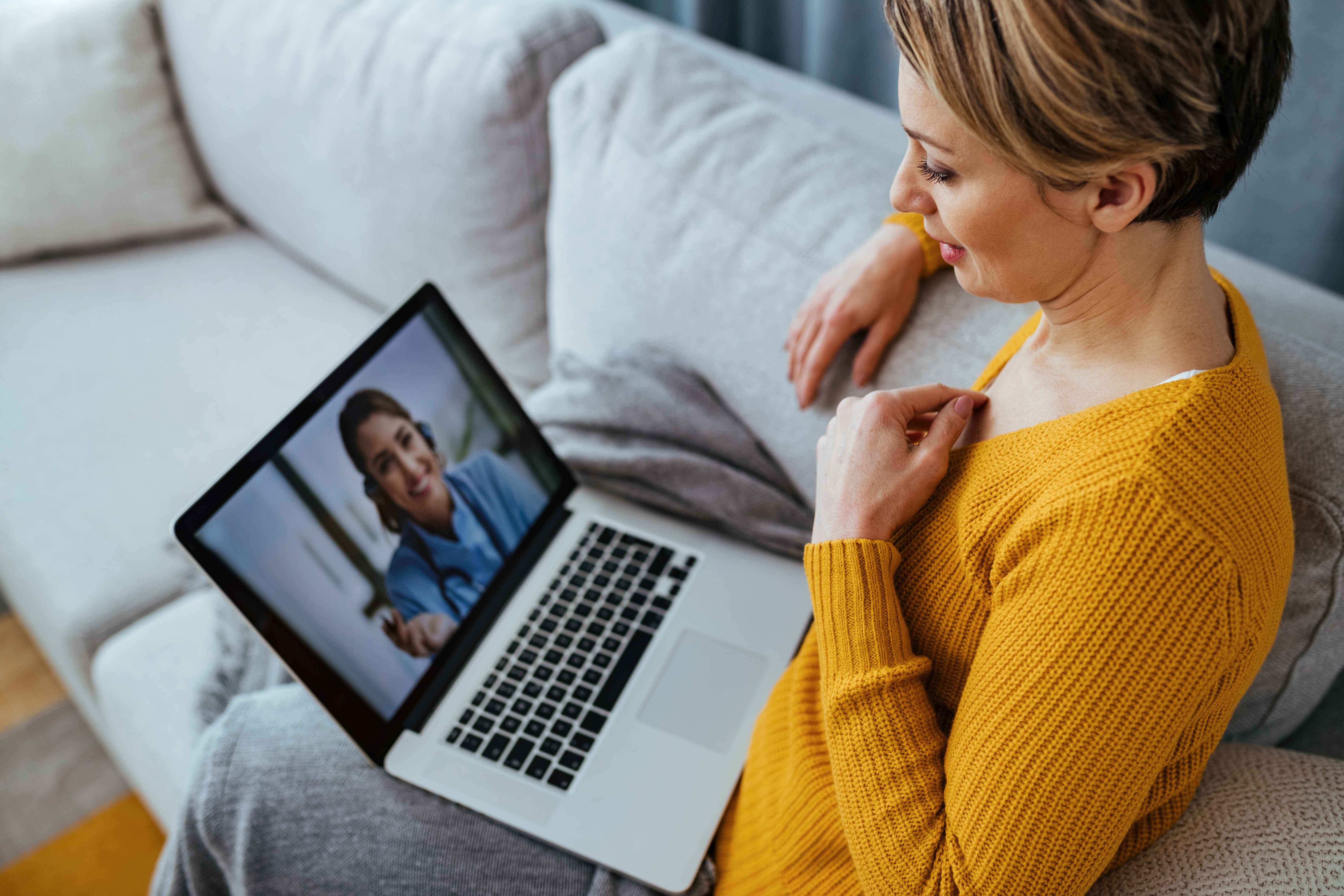 woman having a video call with her doctor